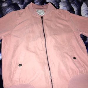 a light pink bomber jacket